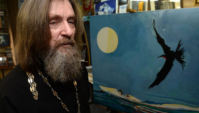 Федор Конюхов с одной из своих картин, 2014 год