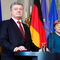 Порошенко пообещал Меркель ускорить процесс обмена пленными