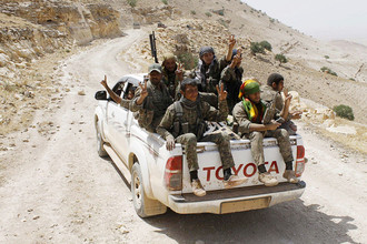 Бойцы курдских вооруженных формирований (YPG) на севере Сирии