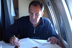 Министр иностранных дел РФ Сергей Лавров в салоне самолета во время поездки в очередную командировку