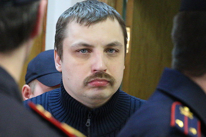 Михаил Косенко, обвиняемый в участии в массовых беспорядках на Болотной площади 6 мая 2012 года
