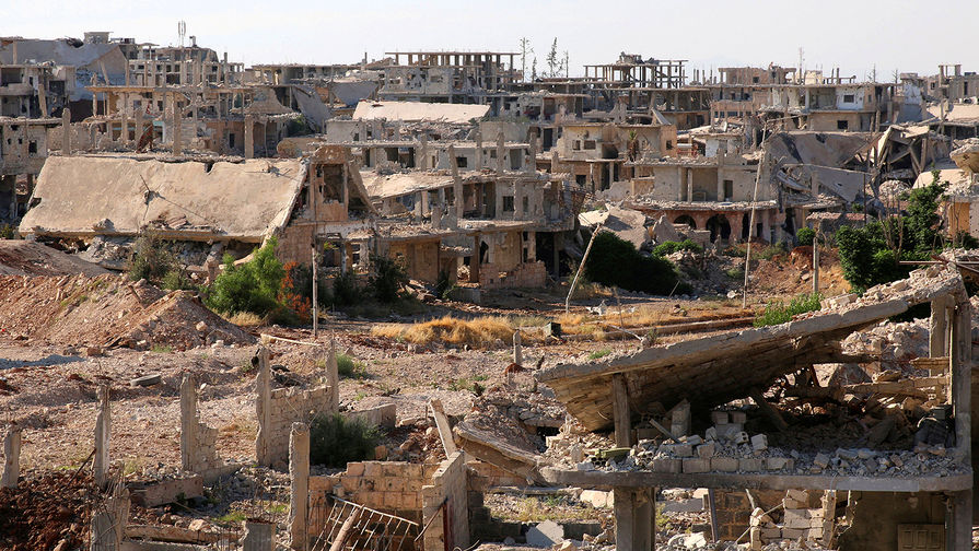 Вид на разрушенный город Даръа в Сирии, июнь 2017 