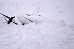 Прототип электролета после падения в сугроб во время тестового полета в рамках презентации лаборатории городских полетов, 7 декабря 2018 года