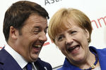 Канцлер Германии Ангела Меркель и премьер Италии Маттео Ренци во время форума «Азия-Европа» (АСЕМ) в Милане, 2014 год
