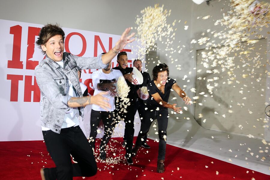 Группа One Direction во время фотоколла на&nbsp;мировой премьере фильма «One Direction: Это мы». Лондон, Великобритания. 19&nbsp;августа 2013&nbsp;года.