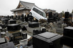 Последствия разрушительного цунами на северо-востоке Японии