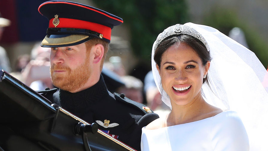 Принц Гарри и Меган Маркл на свадебной церемонии в часовне Святого Георгия в Виндзорском замке, 19 мая 2018