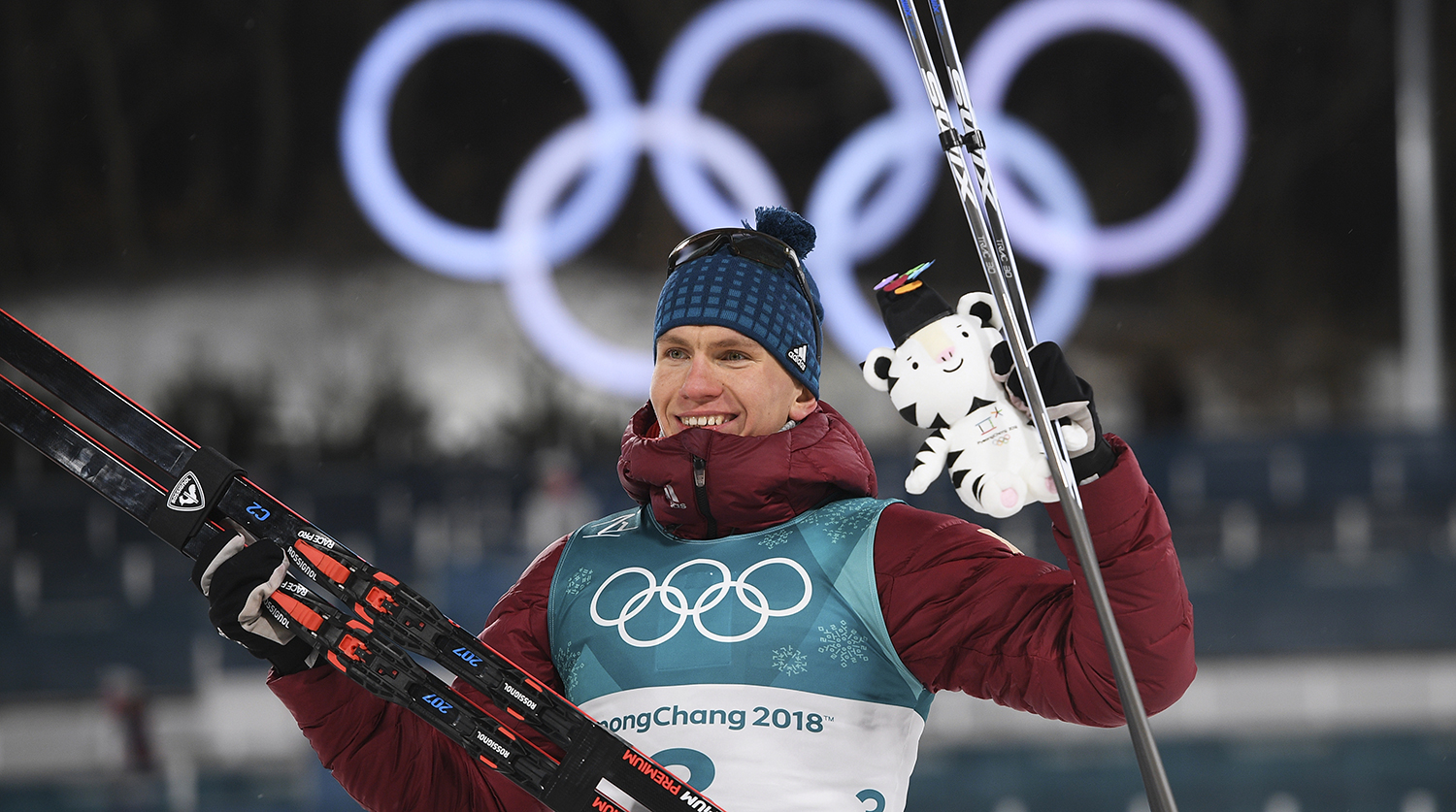 Российский спортсмен Александр Большунов после финиша спринта среди мужчин в полуфинальных соревнованиях по лыжным гонкам на Олимпиаде в Пхенчхане, 13 февраля 2018 года