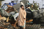 Последствия разрушительного цунами на северо-востоке Японии