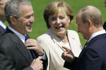 Президент США Джордж Буш-младший, канцлер Германии Ангела Меркель, президент России Владимир Путин на саммите G8 в Хайлигендамме, 2007 год