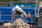 Обломки батискафа «Титан», извлеченные со дна океана недалеко от места крушения «Титаника», во время выгрузки в порту канадского города Сент-Джонс, 28 июня 2023 года 