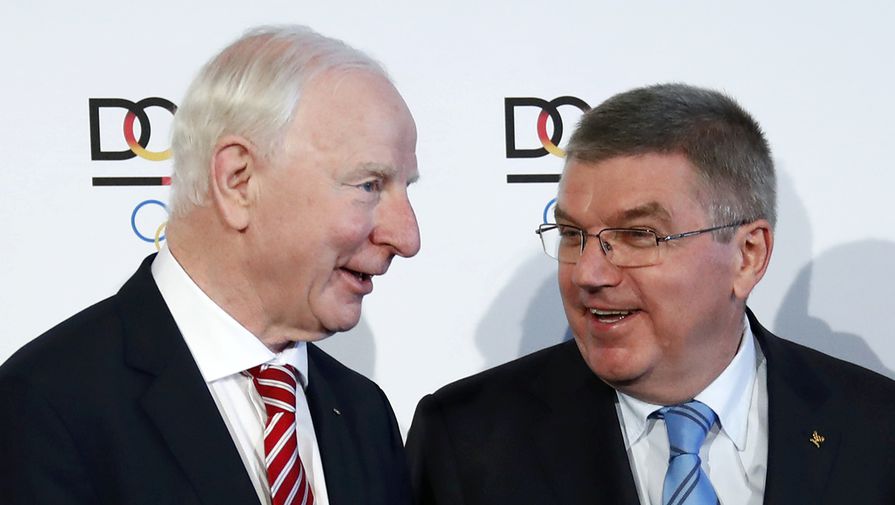 Патрик Хики (слева) и президент МОК Томас Бах незадолго до Олимпиады в хорошем настроении во...
