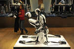 Роботы, выставленные для рекламы новой осенне-зимней коллекции одежды, в торговом зале ЦУМа, 2011 год