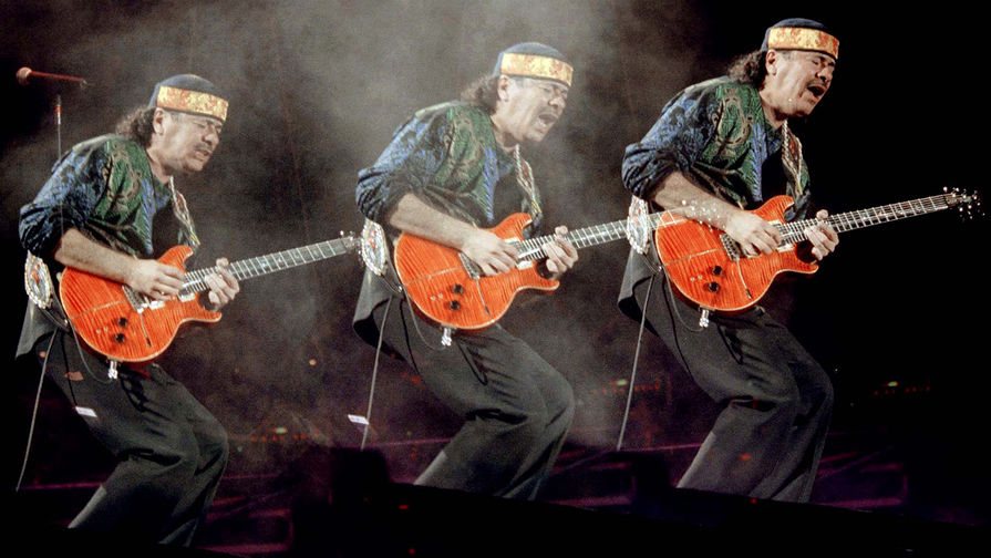 Гитарист Карлос Сантана во время выступления в&nbsp;Мехико, 1999&nbsp;год