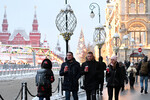 Отдыхающие у Красной площади в Москве