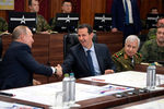 Президент РФ Владимир Путин и президент Сирии Башар Асад во время встречи в Дамаске, 7 января 2020 года