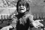 Испуганная девочка после обстрела города моджахедами, 1989 год