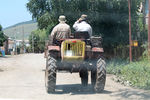 Жители молоканского села Фиолетово на тракторе