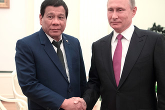 Президент Филиппин Родриго Дутерте и президент России Владимир Путин во время встречи в Москве, 23 мая 2017 года