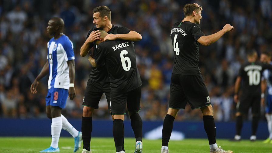 Игроки «Краснодара» радуются победе в матче 3-го отборочного раунда Лиги Чемпионов УЕФА против «Порту»