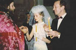Анатолий Ромашин во время венчания со своей последней женой Юлией