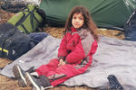 Девочка в лагере нелегальных мигрантов на белорусско-польской границе, 9 ноября 2021 года