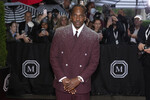 Американский рэпер Pusha T в костюме Louis Vuitton с украшениями Tiffany & Co перед выездом в Метрополитен-музей для участия в благотворительном балу Met Gala, Нью Йорк, США, 5 мая 2025 года