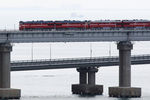 Грузовой поезд едет по Крымскому мосту, 30 июня 2020 года