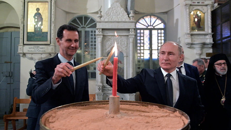 Президент РФ Владимир Путин и президент Сирии Башар Асад в&nbsp;кафедральном соборе Пресвятой Богородицы в&nbsp;Дамаске, 7 января 2020 года
