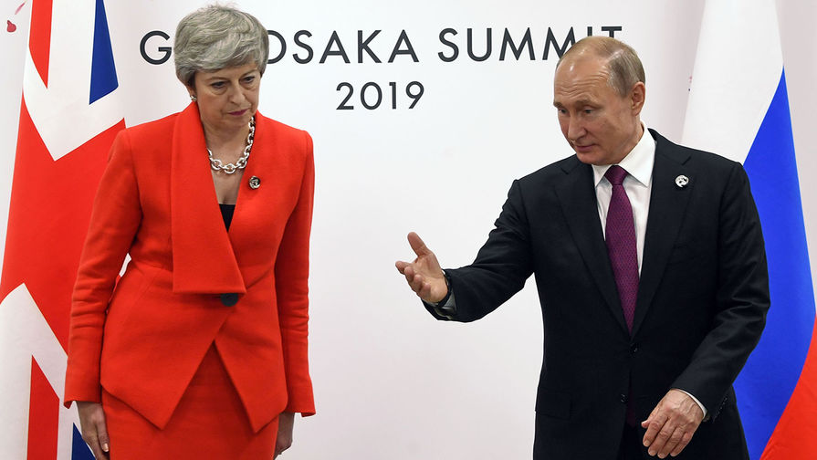 Президент России Владимир Путин и премьер-министр Великобритании Тереза Мэй во время встречи на полях саммита G20, 28 июня 2019 года