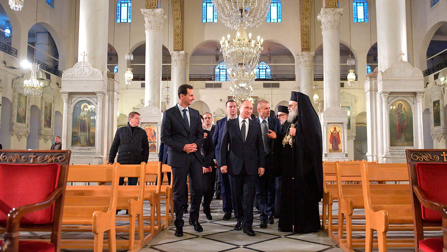 Президент РФ Владимир Путин и президент Сирии Башар Асад в&nbsp;кафедральном соборе Пресвятой Богородицы в&nbsp;Дамаске, 7 января 2020 года
