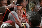 Верующие на праздничном пасхальном богослужении в храме Христа Спасителя в Москве, 20 апреля 2025 года