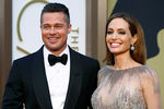 Актер Бред Питт с женой и актрисой Анджелиной Джоли перед началом церемонии вручения премии «Оскар»