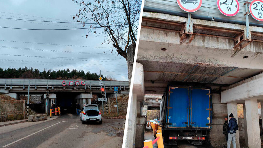 В Москве грузовик застрял под мостом глупости