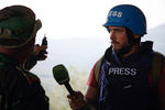 Корреспондент арабской редакции RT Саргон Хадая (справа), попавший под обстрел в Сирии