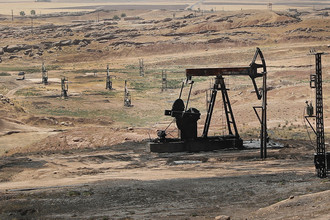 Нефтяное поле в сирийской провинции Эль-Хасака, контролируемое альянсом Демократических сил Сирии (SDF), июль 2017 года