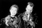 Олимпийские чемпионы по фигурному катанию в Инсбруке Людмила Белоусова и Олег Протопопов с золотыми медалями, 1964 год