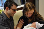Челси Клинтон с мужем и новорожденным сыном