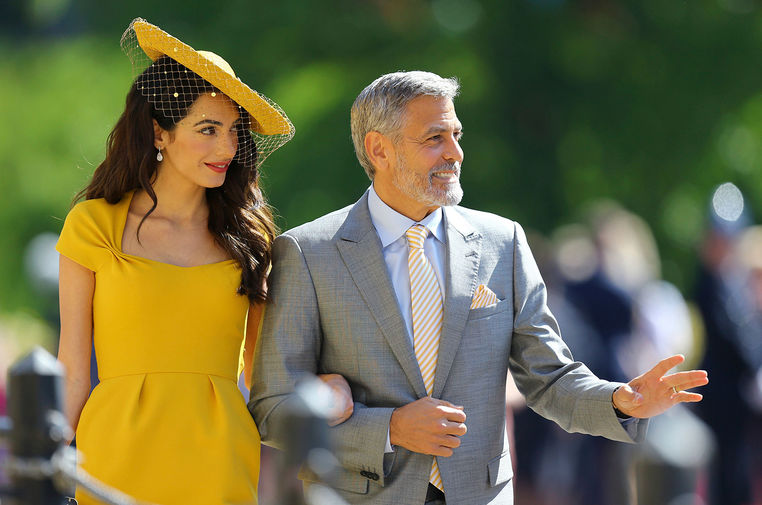Амаль и Джордж Клуни на свадьбе принца Гарри и Меган Маркл в Виндзоре, 19 мая 2018 года