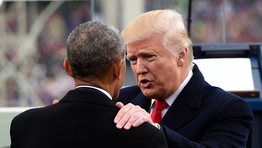 Бывший и действующий президенты США Барак Обама и Дональд Трамп во время инаугурации в Вашингтоне, 20 января 2017 года