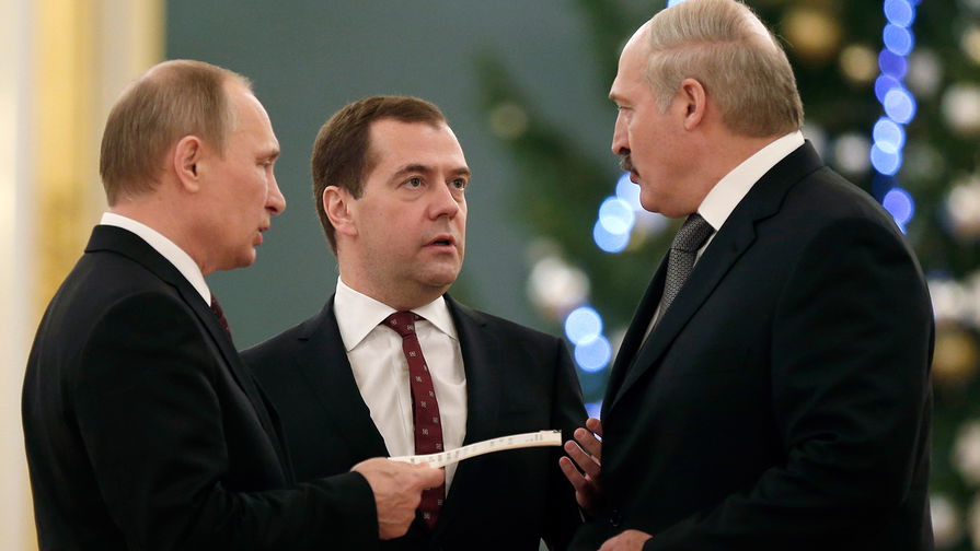 Президент России Владимир Путин, премьер-министр Дмитрий Медведев и президент Белоруссии Александр Лукашенко перед началом заседания ВГС Союзного государства в Кремле, 2013 года