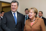 Экс-президент Украины Виктор Янукович и федеральный канцлер Германии Ангела Меркель в Вильнюсе, 2013 год 