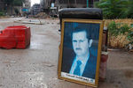 Портрет Башара Асада в центре Алеппо