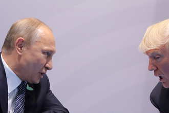 Президент России Владимир Путин и президент США Дональд Трамп во время встречи в рамках саммита G20 в Гамбурге, 7 июля 2017 года