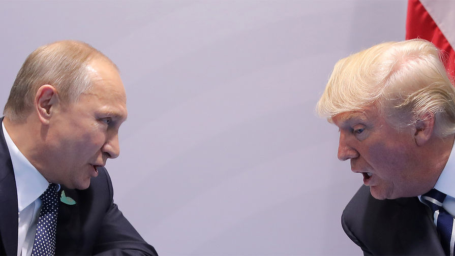 Президент России Владимир Путин и президент США Дональд Трамп во время встречи в рамках саммита G20 в Гамбурге, 7 июля 2017 года