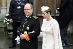 Князь Монако Альбер II и его супруга Шарлен прибывают на церемонию коронации британского короля Карла III и королевы Камиллы в Вестминстерском аббатстве, 6 мая 2023 года