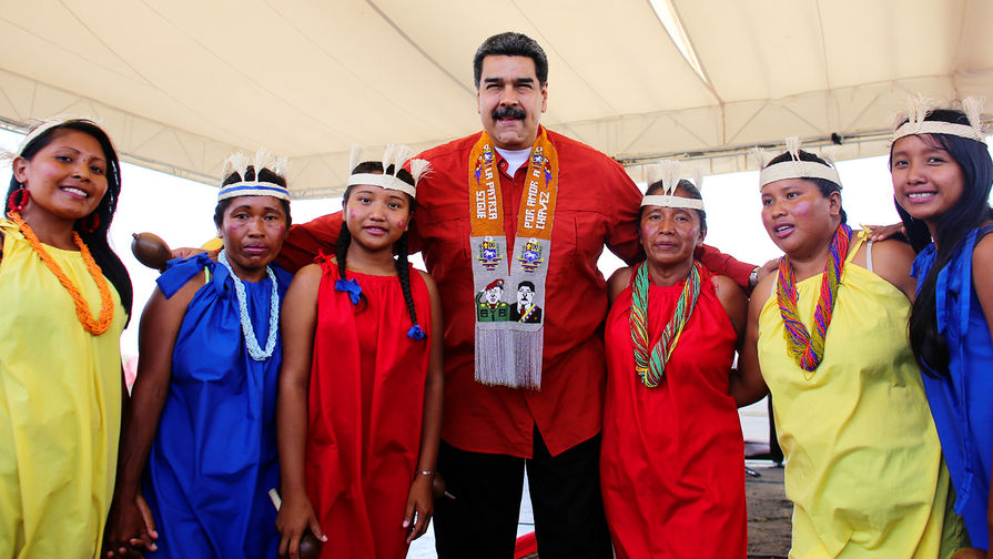 Президент Венесуэлы Николас Мадуро и во время мероприятия в Тукупите, 24 апреля 2018 года