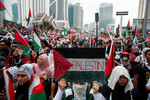 Акция в поддержку палестинцев в Газе возле посольства США в Куала-Лумпуре (Малайзия), 28 октября 2023 года 