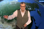 Телеведущий Александр Беляев во время съемок программы «Прогноз погоды»