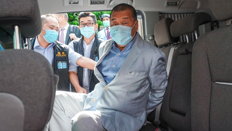 Медиамагнат Джимми Лай во время задержания